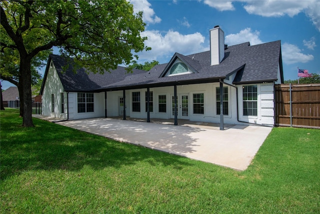 103 Saddle Club Rd, Weatherford, TX 76088 - rear view of property featuring a patio area, a chimney, a shingled roof, and french doors