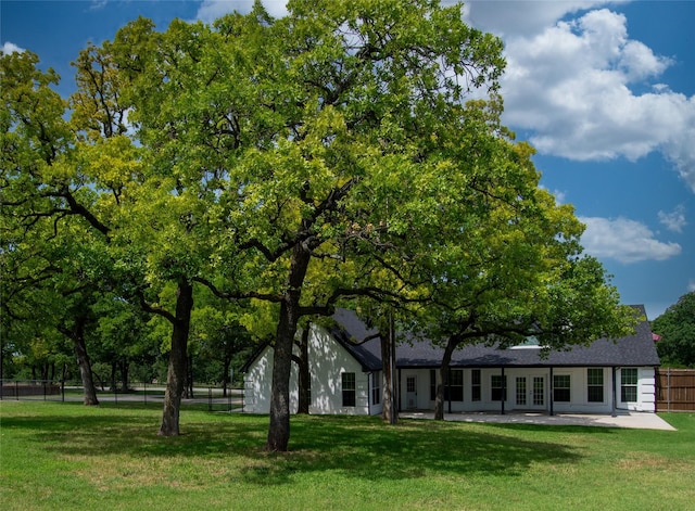 103 Saddle Club Rd, Weatherford, TX 76088 - back of property featuring french doors and a patio