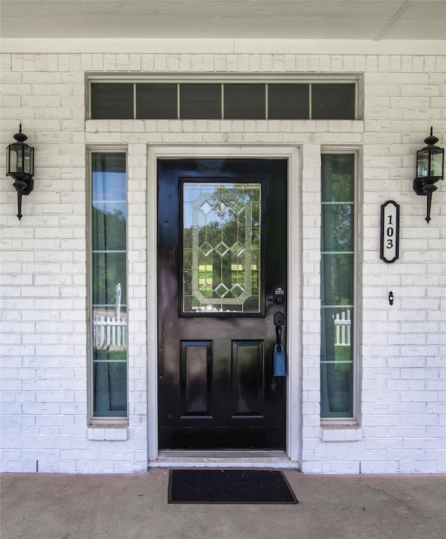 103 Saddle Club Rd, Weatherford, TX 76088 - property entrance featuring brick siding