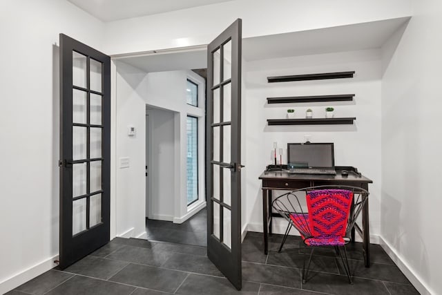 10823 Stone Canyon Rd, Dallas, TX 75230 - office space with french doors, dark tile patterned flooring, and baseboards