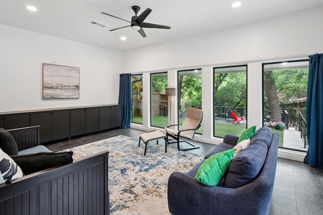 10823 Stone Canyon Rd, Dallas, TX 75230 - living room with ceiling fan and recessed lighting