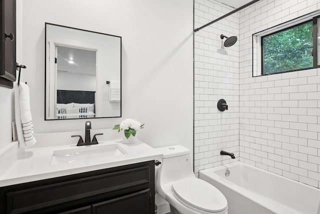 10823 Stone Canyon Rd, Dallas, TX 75230 - bathroom with vanity, toilet, bathing tub / shower combination, and ensuite bathroom