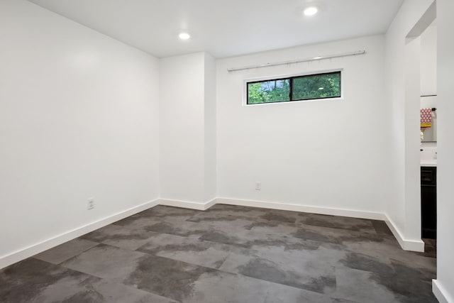 10823 Stone Canyon Rd, Dallas, TX 75230 - spare room with baseboards and recessed lighting