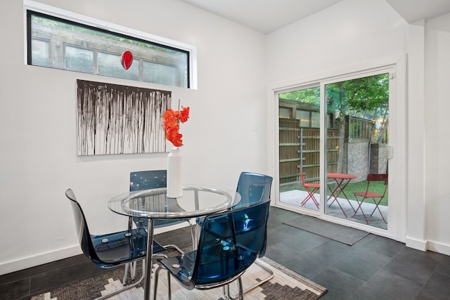 10823 Stone Canyon Rd, Dallas, TX 75230 - dining area featuring baseboards