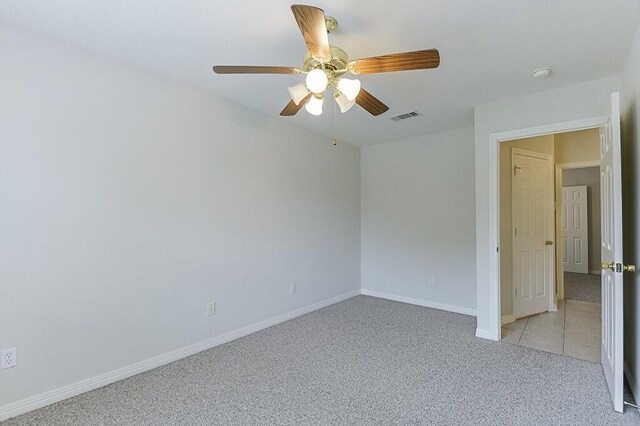 131 Crestridge Dr, Cedar Hill, TX 75104 - spare room featuring light carpet, ceiling fan, a smoke detector, and baseboards