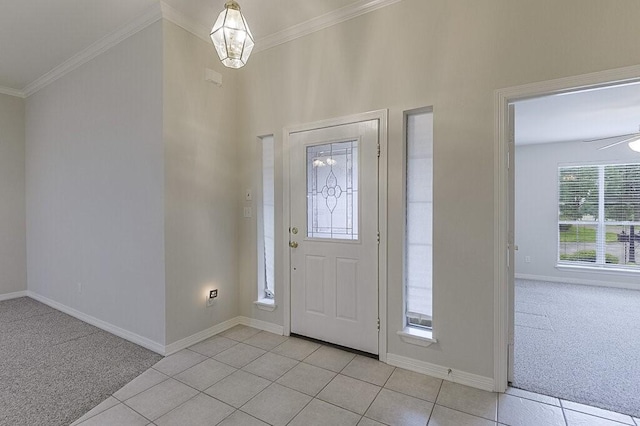 131 Crestridge Dr, Cedar Hill, TX 75104 - foyer with light colored carpet, ornamental molding, baseboards, and light tile patterned flooring