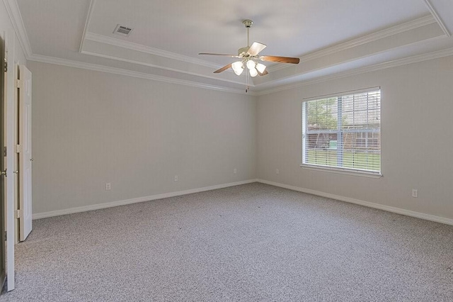 131 Crestridge Dr, Cedar Hill, TX 75104 - carpeted spare room featuring a tray ceiling, a ceiling fan, ornamental molding, and baseboards