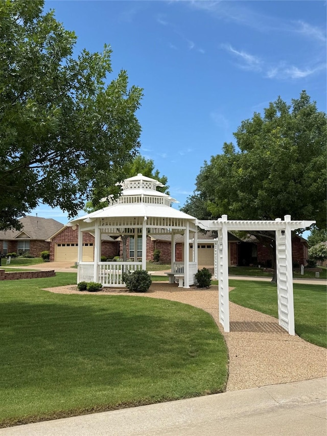 131 Crestridge Dr, Cedar Hill, TX 75104 - view of front of house with a front yard, a pergola, and an attached garage
