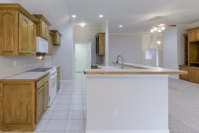 131 Crestridge Dr, Cedar Hill, TX 75104 - kitchen with white appliances, ceiling fan, light countertops, crown molding, and brown cabinets