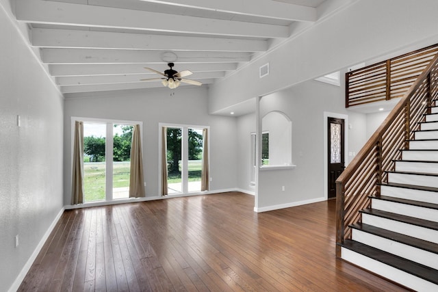 815 N Seven Points Dr, Kemp, TX 75143 - unfurnished living room featuring baseboards, wood-type flooring, ceiling fan, and stairway