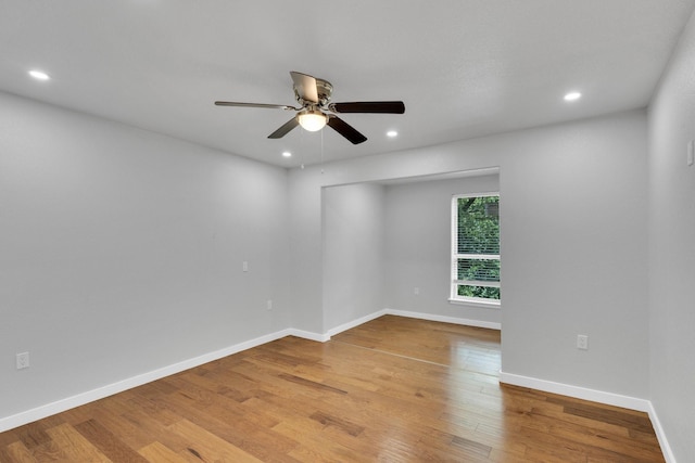 815 N Seven Points Dr, Kemp, TX 75143 - spare room with a ceiling fan, light wood-style floors, recessed lighting, and baseboards