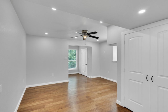 815 N Seven Points Dr, Kemp, TX 75143 - empty room with wood finished floors, recessed lighting, baseboards, and ceiling fan