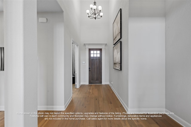 5226 Rowlan Row, Midlothian, TX 76065 - entryway featuring a chandelier, wood finished floors, and baseboards