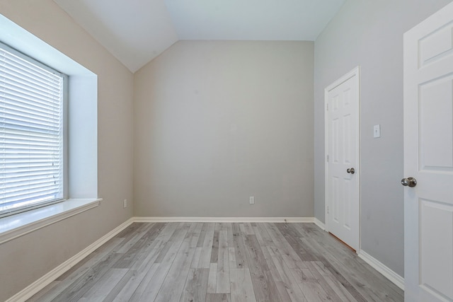 6937 Andress Dr, Fort Worth, TX 76132 - unfurnished room featuring light wood-style flooring, vaulted ceiling, and baseboards