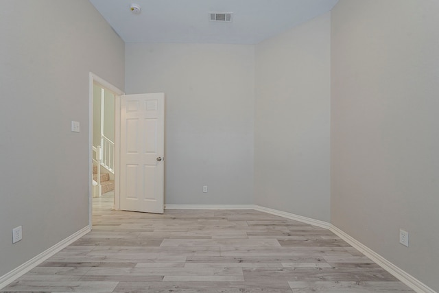 6937 Andress Dr, Fort Worth, TX 76132 - spare room with a smoke detector, light wood-type flooring, and baseboards