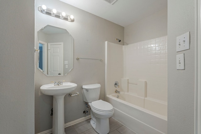 6937 Andress Dr, Fort Worth, TX 76132 - full bathroom featuring toilet,  shower combination, and a sink