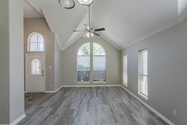 6937 Andress Dr, Fort Worth, TX 76132 - foyer with ceiling fan, wood finished floors, baseboards, lofted ceiling, and ornamental molding