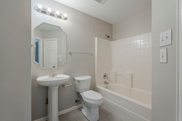 6937 Andress Dr, Fort Worth, TX 76132 - full bath featuring toilet, shower / bathtub combination, and a sink