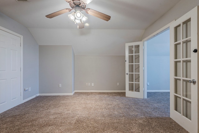 6937 Andress Dr, Fort Worth, TX 76132 - unfurnished room featuring french doors, carpet flooring, vaulted ceiling, ceiling fan, and baseboards