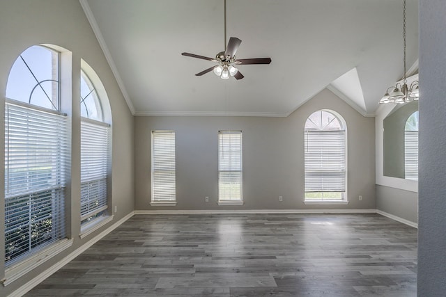 6937 Andress Dr, Fort Worth, TX 76132 - empty room featuring vaulted ceiling, dark wood-style floors, a ceiling fan, baseboards, and ornamental molding