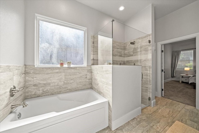 184 Lakeview Cir, Pilot Point, TX 76258 - full bathroom featuring a stall shower, a garden tub, and plenty of natural light
