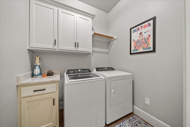 184 Lakeview Cir, Pilot Point, TX 76258 - laundry room featuring washer and dryer, cabinet space, baseboards, and dark wood finished floors