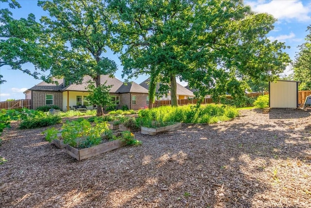 184 Lakeview Cir, Pilot Point, TX 76258 - view of yard with a garden