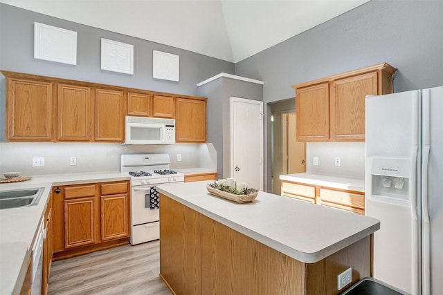 9805 Rockledge Rd, Fort Worth, TX 76108 - kitchen featuring white appliances, high vaulted ceiling, light countertops, light wood-style floors, and a center island