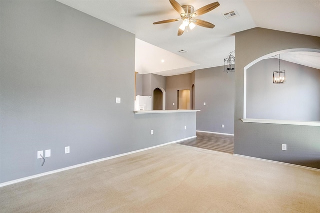 9805 Rockledge Rd, Fort Worth, TX 76108 - carpeted empty room with arched walkways, a ceiling fan, lofted ceiling, and baseboards