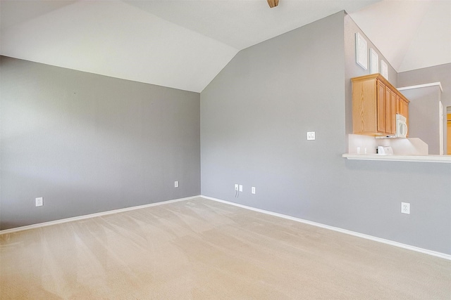 9805 Rockledge Rd, Fort Worth, TX 76108 - additional living space featuring lofted ceiling, light colored carpet, and baseboards