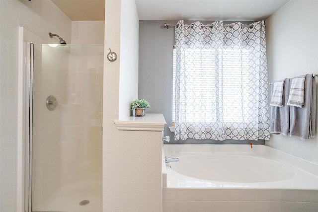 9805 Rockledge Rd, Fort Worth, TX 76108 - full bathroom featuring plenty of natural light, a stall shower, and a garden tub