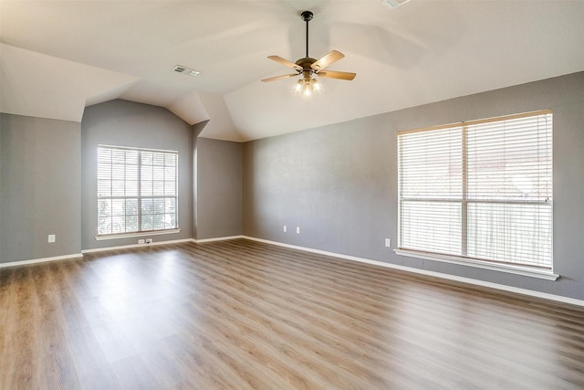 9805 Rockledge Rd, Fort Worth, TX 76108 - spare room featuring a ceiling fan, wood finished floors, baseboards, and lofted ceiling