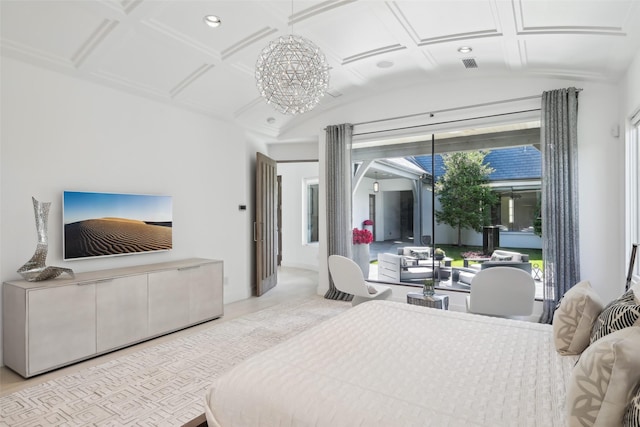 315 Oxford Pl, Coppell, TX 75019 - bedroom featuring vaulted ceiling and a chandelier
