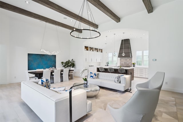 315 Oxford Pl, Coppell, TX 75019 - living area with a chandelier, beamed ceiling, a high ceiling, recessed lighting, and baseboards