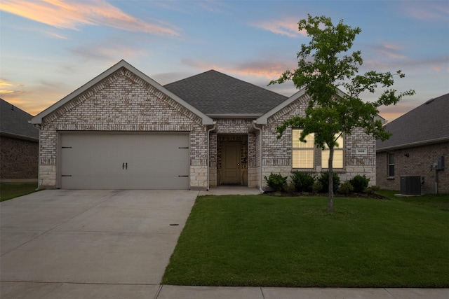 506 Cool Canyon Trl, Princeton, TX 75407 - french country inspired facade with an attached garage, a front yard, central air condition unit, driveway, and stone siding