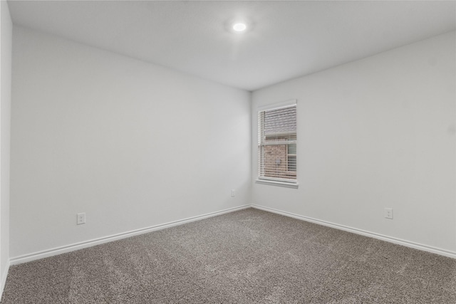506 Cool Canyon Trl, Princeton, TX 75407 - spare room featuring carpet and baseboards