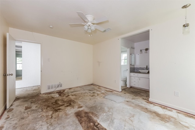 245 Straw Rd, Saginaw, TX 76179 - unfurnished bedroom with a sink, ensuite bathroom, and a ceiling fan