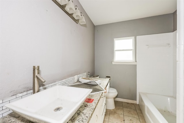 245 Straw Rd, Saginaw, TX 76179 - full bath with toilet, vanity, tile patterned flooring, and baseboards