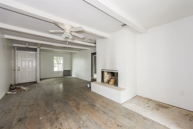 245 Straw Rd, Saginaw, TX 76179 - unfurnished living room featuring beam ceiling, a brick fireplace, a ceiling fan, and wood finished floors