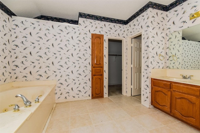 4005 Cavalier Dr, Rowlett, TX 75088 - full bathroom featuring wallpapered walls, a tub with jets, vanity, baseboards, and tile patterned floors