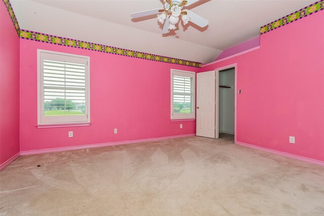 4005 Cavalier Dr, Rowlett, TX 75088 - unfurnished bedroom with vaulted ceiling, carpet, and baseboards