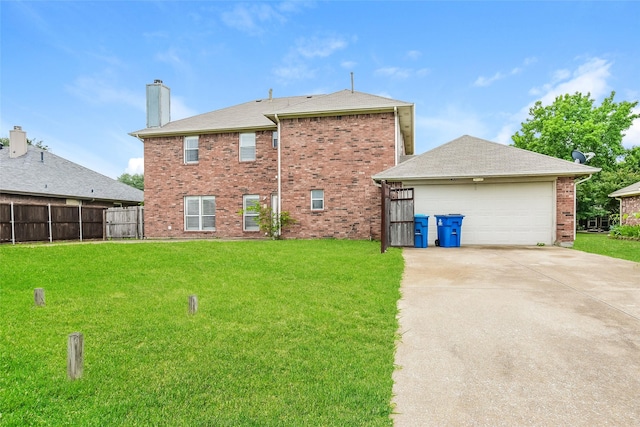 4005 Cavalier Dr, Rowlett, TX 75088 - rear view of house featuring brick siding, a chimney, and driveway