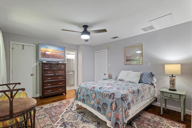2816 Nottingham Dr, Denton, TX 76209 - bedroom featuring wood finished floors, ensuite bathroom, ceiling fan, and baseboards