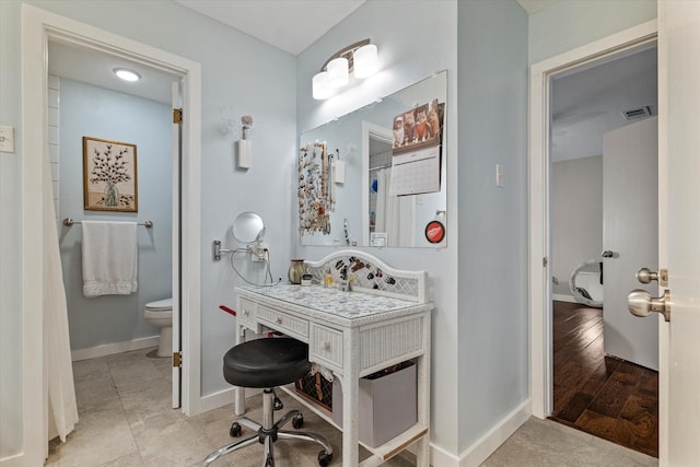 2816 Nottingham Dr, Denton, TX 76209 - bathroom with toilet and baseboards