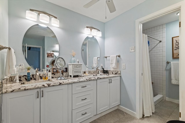 2816 Nottingham Dr, Denton, TX 76209 - full bathroom featuring double vanity, a tile shower, a ceiling fan, and baseboards
