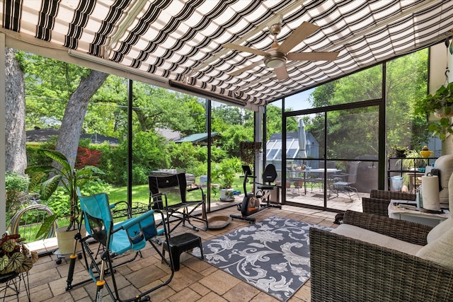 2816 Nottingham Dr, Denton, TX 76209 - sunroom featuring a ceiling fan and an outdoor hangout area