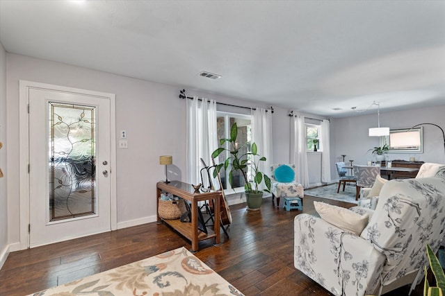 2816 Nottingham Dr, Denton, TX 76209 - living room with dark wood-style flooring and baseboards