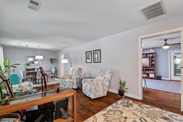 2816 Nottingham Dr, Denton, TX 76209 - living area with wood finished floors, baseboards, and ceiling fan