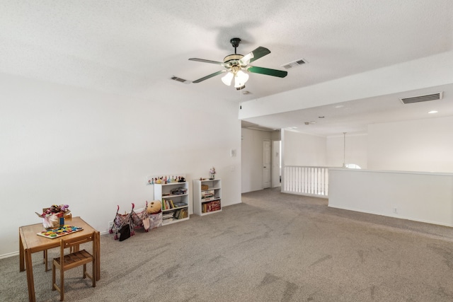 102 Pinion Dr, Euless, TX 76039 - carpeted empty room with ceiling fan and a textured ceiling