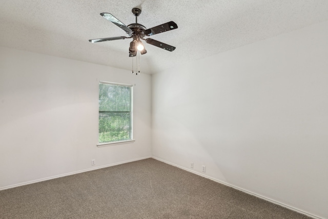 102 Pinion Dr, Euless, TX 76039 - empty room with ceiling fan, a textured ceiling, and carpet